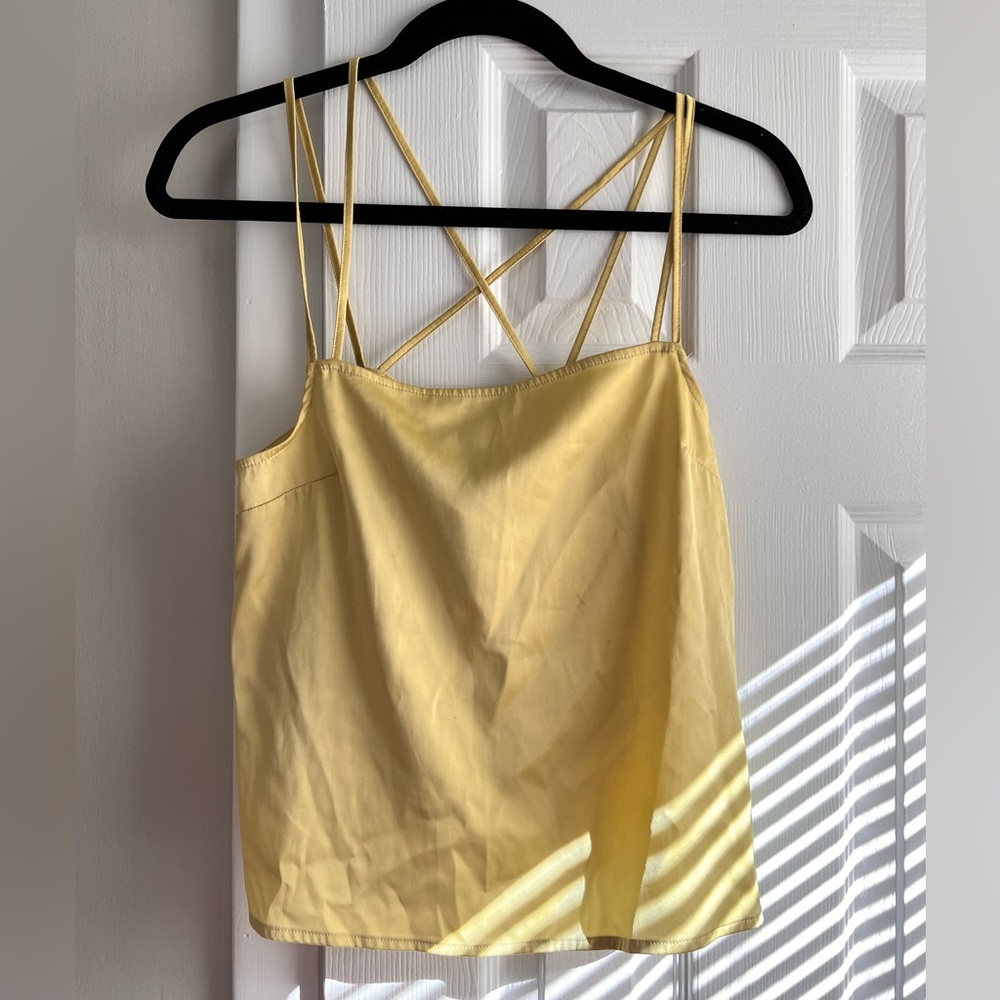Cross strap tank